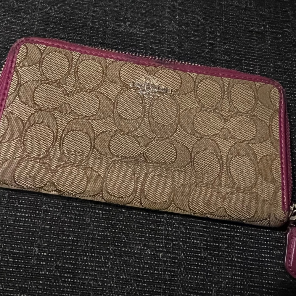 Coach Tan and Pink Signature Wallet.